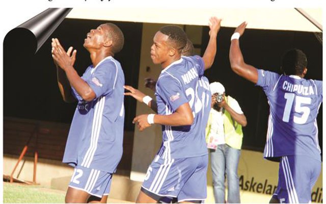 TO THE HEAVENS . . . Young Dynamos striker Quality Kangadze (left) celebrates his winning goal against Chapungu United with his teammates at the National Sports Stadium yesterday