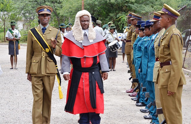 Justice Maxwell Takuva inspects a quarter guard mounted by ZRP in Hwange (file pic)