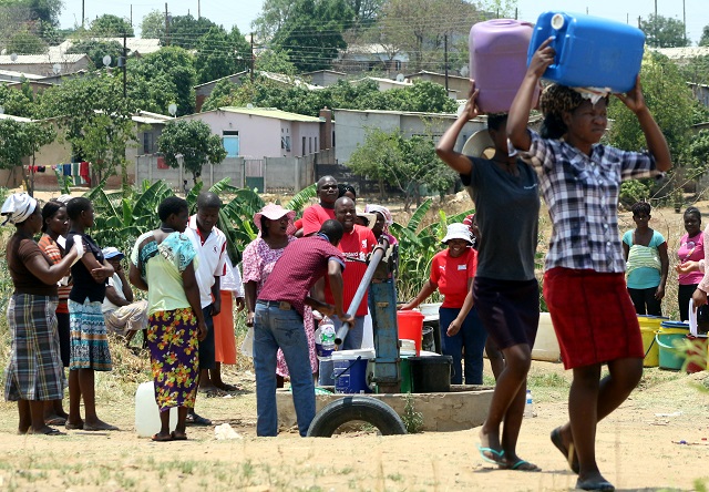 Bulawayo residents fetch water from a borehole in this file photo (Picture: Eliah Saushoma)
