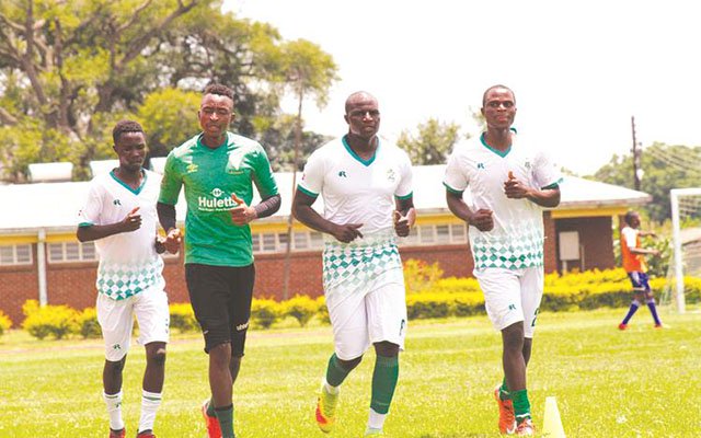 GREEN WARRIORS . . . CAPS United players (from left) Valentine Musarurwa, goalkeeper Chris Mverechena, midfielder Oscar Machapa and defender Steve Makatuka go through their paces during the club’s training session in Harare