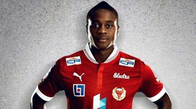 Achford Gutu proudly poses for the camera after securing a deal to join Swedish side IFK Varnamo