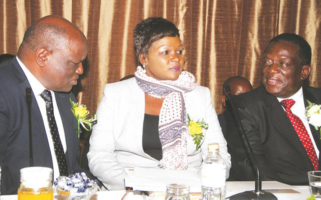 Then Vice President Emmerson Mnangagwa (right) chats with Chief Justice Luke Malaba (left), while Justice, Legal and Parliamentary Affairs Secretary Mrs Virginia Mabhiza looks on during the launch of Prosecuting Authority of Zimbabwe Strategic Plan document in Harare. — (Picture by Justin Mutenda)