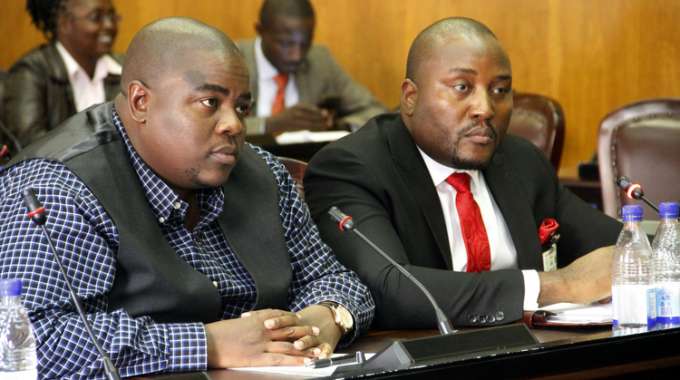 Mr Wicknell Chivhayo (left) and Intratek lawyer Mr Bruce Tokwe giving evidence to members of the parliamentary portfolio committee on Mines and Energy yesterday. Picture by John Manzongo