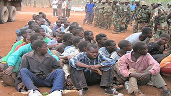 File picture of diamond panners rounded up by soldiers in the Marange area