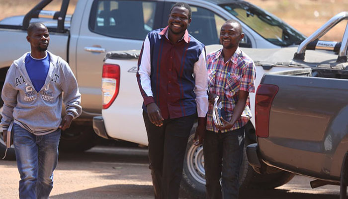 Prophetic Healing and Deliverence Ministries leader Prophet Walter Magaya arrives at Harare Magistrates’ Courts escorted by detectives for his initial bail hearing on Saturday. – Picture: Lee Maidza