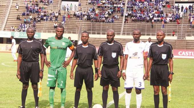 A MAN OF INTEGRITY . . . Top Zimbabwean referee Norman Matemera (seen here standing third from right) ahead of the Harare Derby at the National Sports Stadium, rejected a $10 000 bribe in a CAF Confederation Cup match in Equatorial Guinea last week
