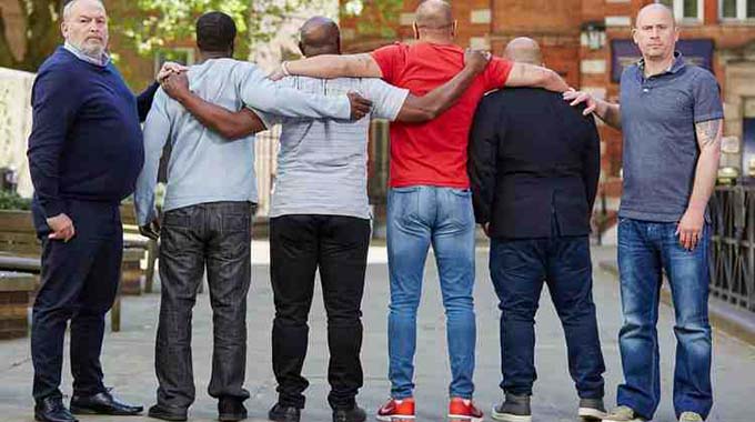 TOGETHER AS ONE . . . Former Chelsea youth players Grant Lunn (far left) and Gary Baker (right) show their support for racism allegations made by four other former players of the English Premiership giants, who do not want to be identified. — The Guardian