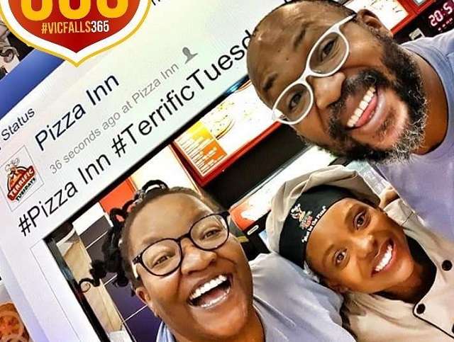 Carl Joshua Ncube and wife Nelsy (left) and a Pizza Inn staffer (file photo)