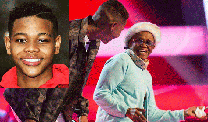 Donel Mangena and his grandmother on stage
