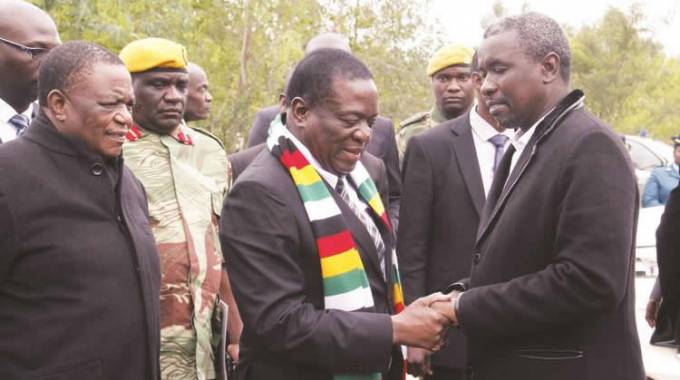 President Mnangagwa consoles Mr Kudakwashe Tagwirei while flanked by Vice President Constantino Chiwenga before the burial of the businessman's father, Sekuru Phineas Tagwirei, in Shurugwi yesterday. - (Picture by John Manzongo)