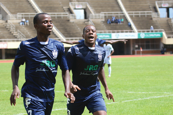 Ngezi Platinum midfielder Qadr Amini (right) joins goalscorer Terrence Dzvukamanja in celebrating a winning goal (Picture by The Standard)