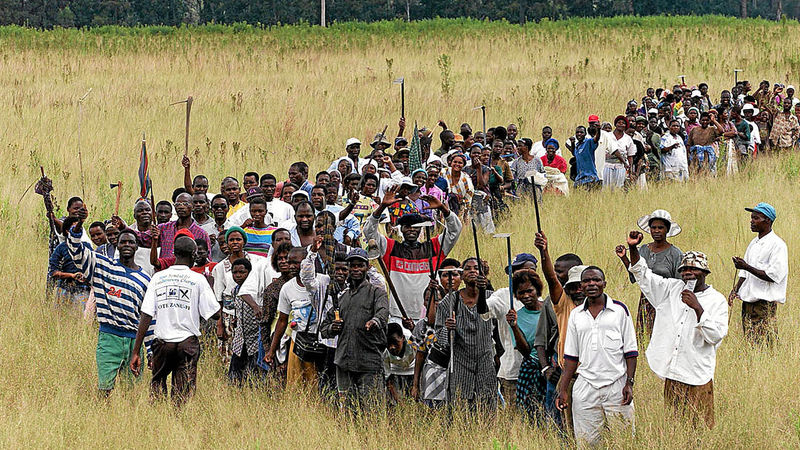 File picture of a farm invasion in Zimbabwe (Picture by Alexander Joe)