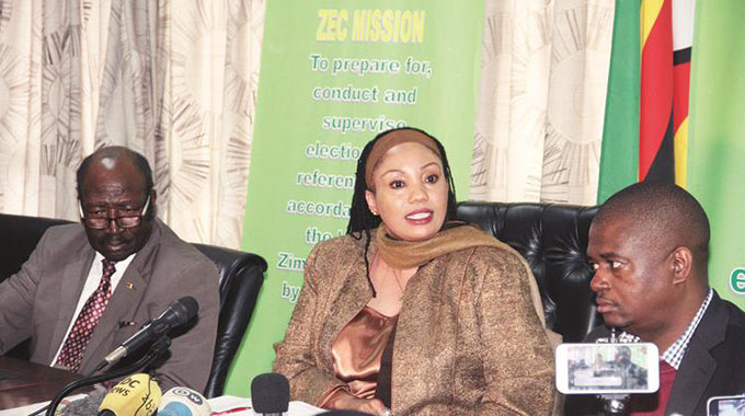 ZEC Chairwoman Justice Priscilla Chigumba addresses journalists while flanked by commissioners — Dr Ngoni Kundidzora (left) and Dr Qhubani Moyo — at a Press conference in Harare. — (Picture by Innocent Makawa)