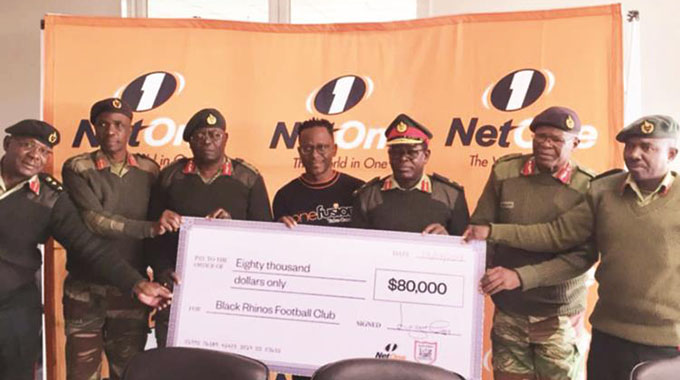 GROWING NETWORK . . . NetOne chief executive Lazarus Muchenje joins Black Rhinos officials at the presentation of an $80 000 sponsorship package in Harare yesterday
