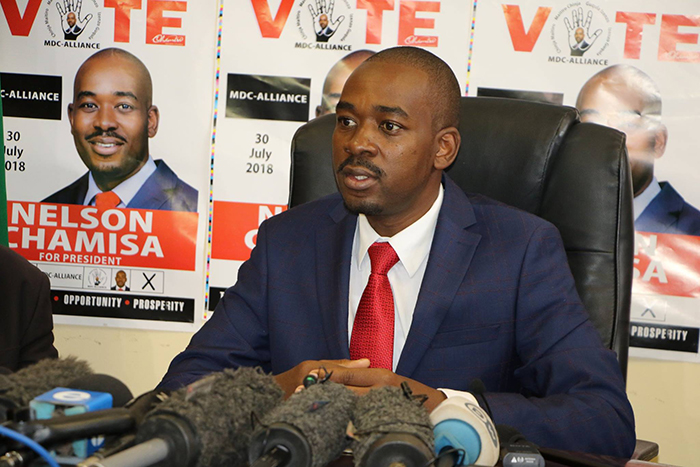 Nelson Chamisa posters behind