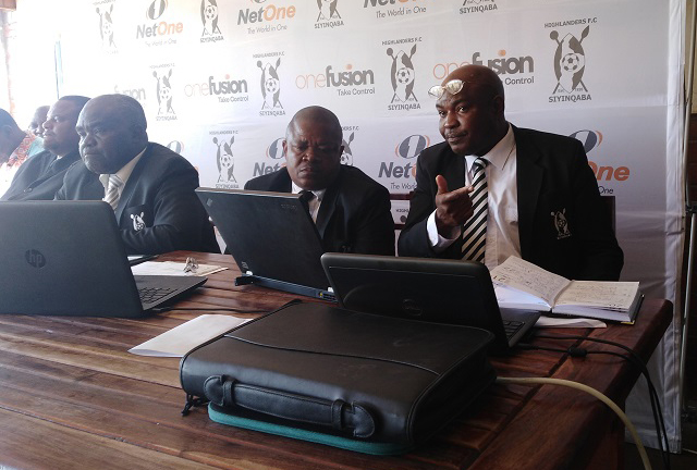 Highlanders treasurer Donald Ndebele (right) presents the mid-year financial position of the club to members at the clubhouse yesterday while secretary Israel Moyo (centre) and chairman Kenneth Mhlophe follow proceedings