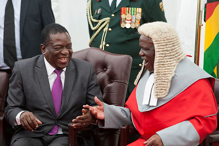 Done Deal: President Emmerson Mnangagwa shares a lighter moment with Chief Justice Luke Malaba