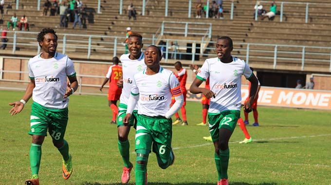 CAPTAIN COURAGEOUS . . . CAPS United skipper Hardlife Zvirekwi (second from right) celebrates with his teammates after scoring his side’s solitary goal in their win over Black Rhinos at Rufaro on Saturday