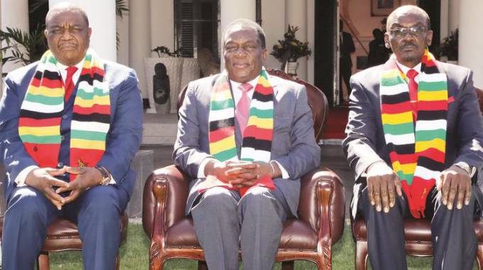 President Mnangagwa poses for a photograph with the newly-sworn in Vice Presidents Dr Constantino Chiwenga (left) and Kembo Mohadi at State House in Harare. — (Picture by Tawanda Mudimu)