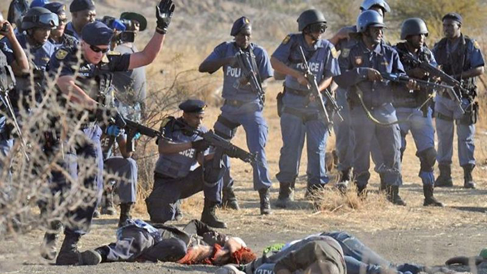 Government is faced with a new report that police who killed the 34 striking miners were taking vengeance for two of their comrades killed two days earlier.