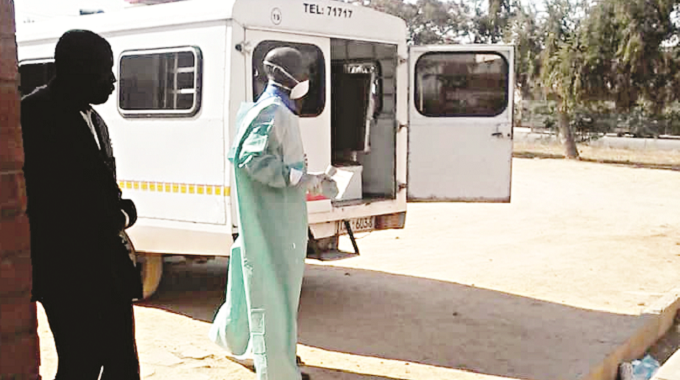 A cholera victim is taken from Entumbane Clinic to Thorngrove Infectious Diseases Hospital in Bulawayo