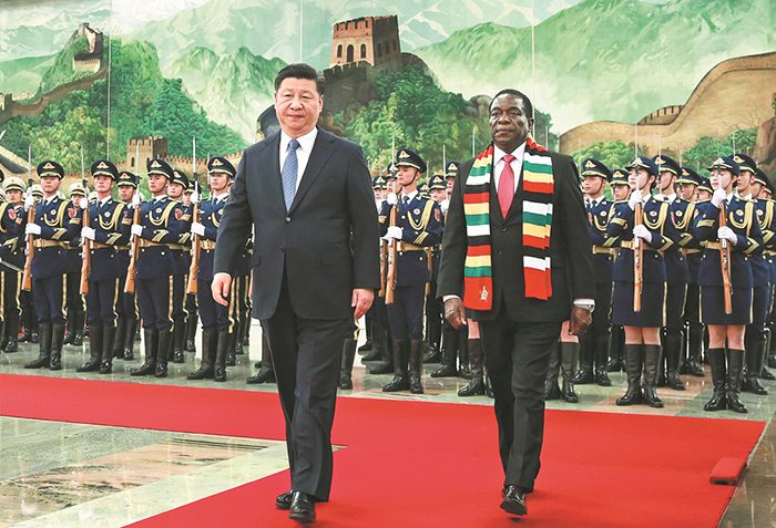 President Xi Jinping escorts Zimbabwe President Emmerson Mnangagwa during a visit at the Great Hall of the People in Beijing.
