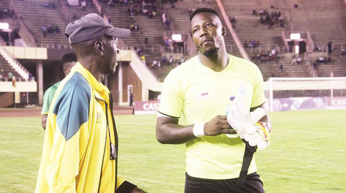WALKING WOUNDED . . . George Chigova (right) and Warriors goalkeepers’ coach Brenna Msiska will be eagerly awaiting results of the scan on the Zimbabwe Number One’s twisted knee today