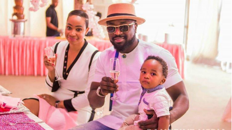 Elikem and Pokello with their son