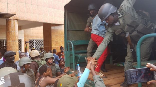 Forces helped students into their trucks