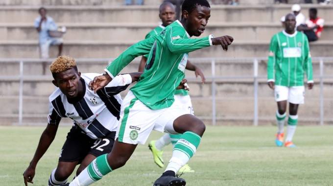 Chiefs FC’s Lucky Ndlela beats his marker Nigel Makumbe in a match played at Barbourfields Stadium in Bulawayo yesterday.