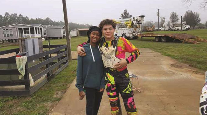 BREAKING NEW GROUND . . . Top Zimbabwean female motocross rider Tanya Muzinda (left) receives a warm welcome from Mexican biker Terrence at Millsaps Training Facility at Cairo in Georgia, United States, where they are both attending a “boot camp” ahead of this year’s Thor Winter Olympics Supercross and Motocross Championships in Florida