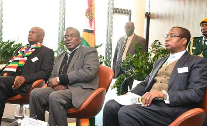 President Emmerson Mnangagwa (centre) seen here with Finance Minister Mthuli Ncube (right)
