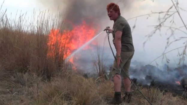 Bernadette Hall went to her black neighbour's aid to fight a bush fire