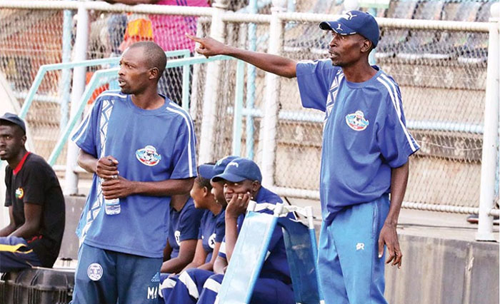 Lloyd Chigowe (right) seen here with his assistant Murape Murape (left)