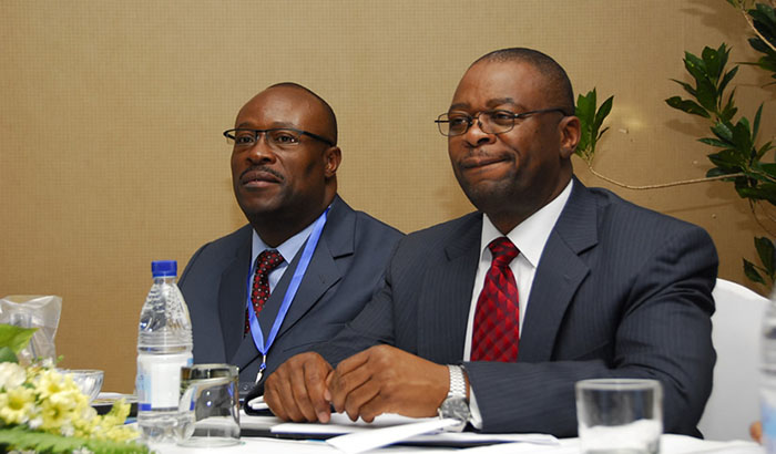 Enock Chitekedza the then Association of Health Care Funders of Zimbabwe (AHFoZ) Chairman and Dr Douglas Mombeshora then Deputy Minister of Health and Child Welfare at the VIP Table at AHFoZ 2012 All-Stakeholders’ conference on Health.