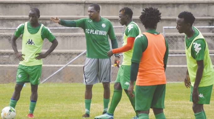 FC Platinum coach Norman Mapeza (second from left) and his squad train in this file photo. They will conduct night training at the National Sports Stadium in preparation for the team’s next match in Tunisia