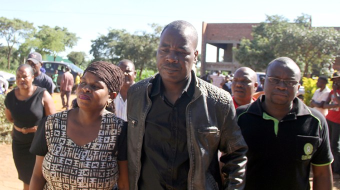 Pastor Charles Charamba and his wife Olivia arriving at Tuku's funeral in Norton