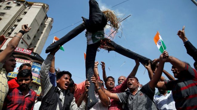 Some Indians took to the streets, burning an effigy of Pakistan, after news of the air strikes broke