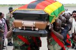 Prof Ndlovu’s body to be airlifted to Plumtree rural home Pallbearers carry the casket bearing the body of national hero Professor Callistus Ndlovu on arrival at Joshua Mqabuko Nkomo International Airport in Bulawayo. Accompanying the body from South Africa was Cde Ndlovu’s widow Angeline (behind the pallbearers). — Picture by Eliah Saushoma