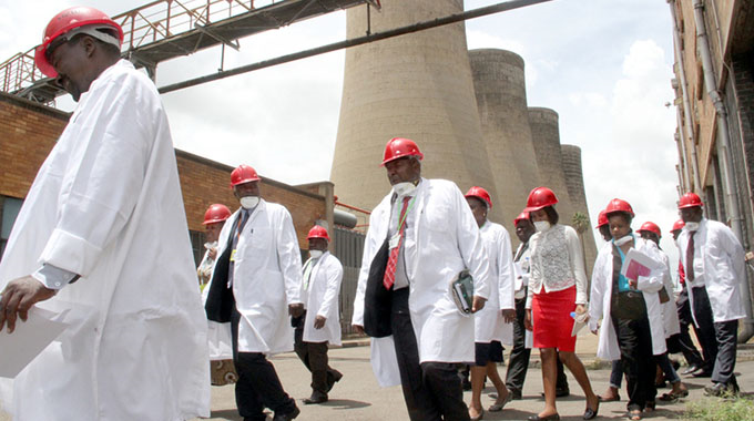 Members of the Parliamentary Portfolio Committee on Energy and Power Development tour the Harare thermal power station yesterday. — Picture by Innocent Makawa