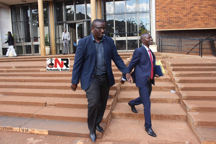 Former Sunday Mail editor Edmund Kudzayi is now a free man after a Harare Magistrate acquitted him of charges related to a camouflage umbrella that was found in his car last month.