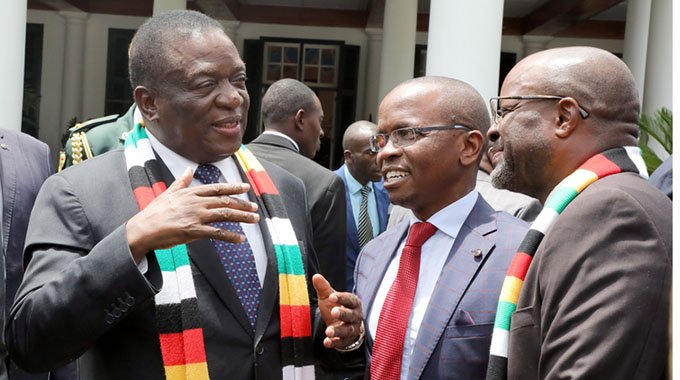 President Mnangagwa speaks to members of the Presidential Advisory Council, businessman Dr Shingi Munyeza (second from right) and prominent lawyer Mr Edwin Manikai, at the inaugural meeting of the council at State House. - Picture by Tawanda Mudimu