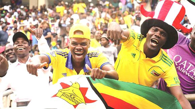 WE’VE DONE IT . . . soccer fans bask in the glory of the Warriors qualification for the 32nd African Cup of Nations finals