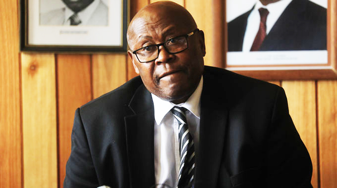 Primary and Secondary Education Minister Ambassador Cain Mathema
