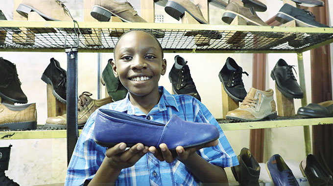 Frank Simali at his family’s shoe factory, Millennium Footwear, in Belmont, Bulawayo