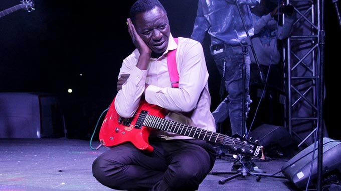 Alick Macheso portrays a sad gesture while performing at Castle Tankard on Saturday