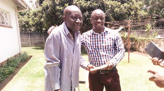 BIRTHDAY BOY . . . Zimbabwe and Dynamos football legend David “Yogi” Mandigora (left) shares a lighter moment with another former DeMbare star player, Makwinji Soma-Phiri, at his home in Mandara. Mandigora turned 62 yesterday