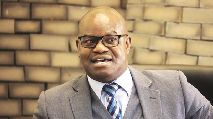 Secretary for Information, Publicity and Broadcasting Services Mr Nick Mangwana makes a presentation at a media stakeholders’ meeting