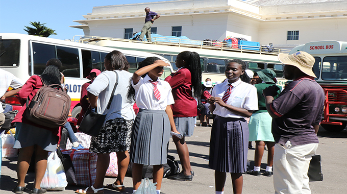 It was a hive of activity at the Bulawayo Large City Hall car park yesterday as pupils boarded buses to their boarding schools ahead of the opening of the school term today