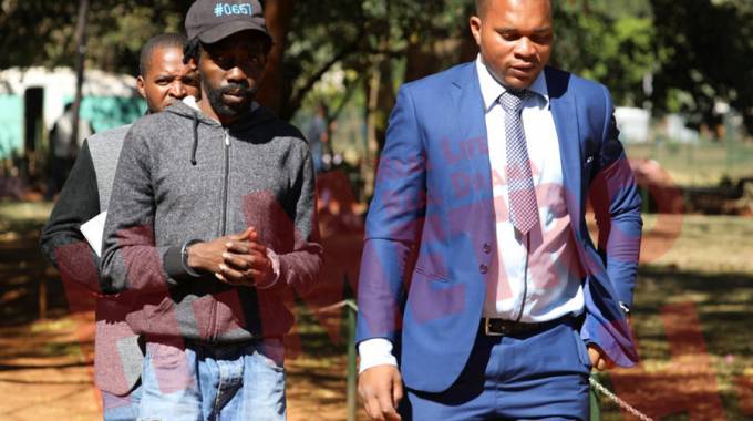 Phillip Kunaka (left)